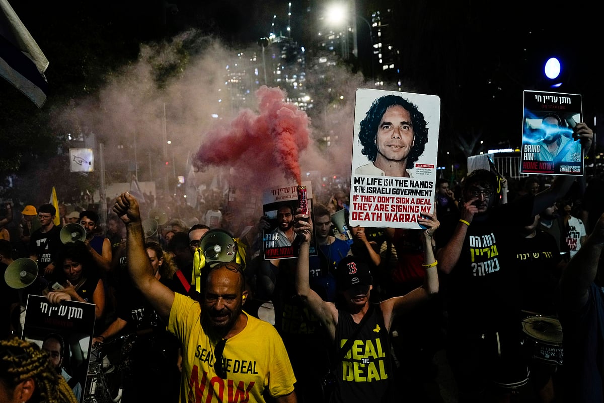 via AP : People attend a rally demanding a cease-fire deal in Tel Aviv, Israel