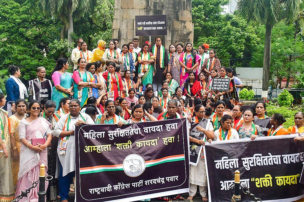 Photo: PTI : NCP (SP) protests for assent to Shakti bill