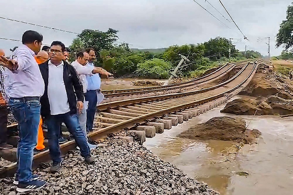 railway tracks washed away afteer heavy rainfall in Secunderabad
