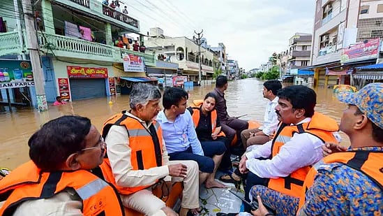 Andhra Pradesh Chief Minister Chandrababu Naidu visiting flood-affected areas