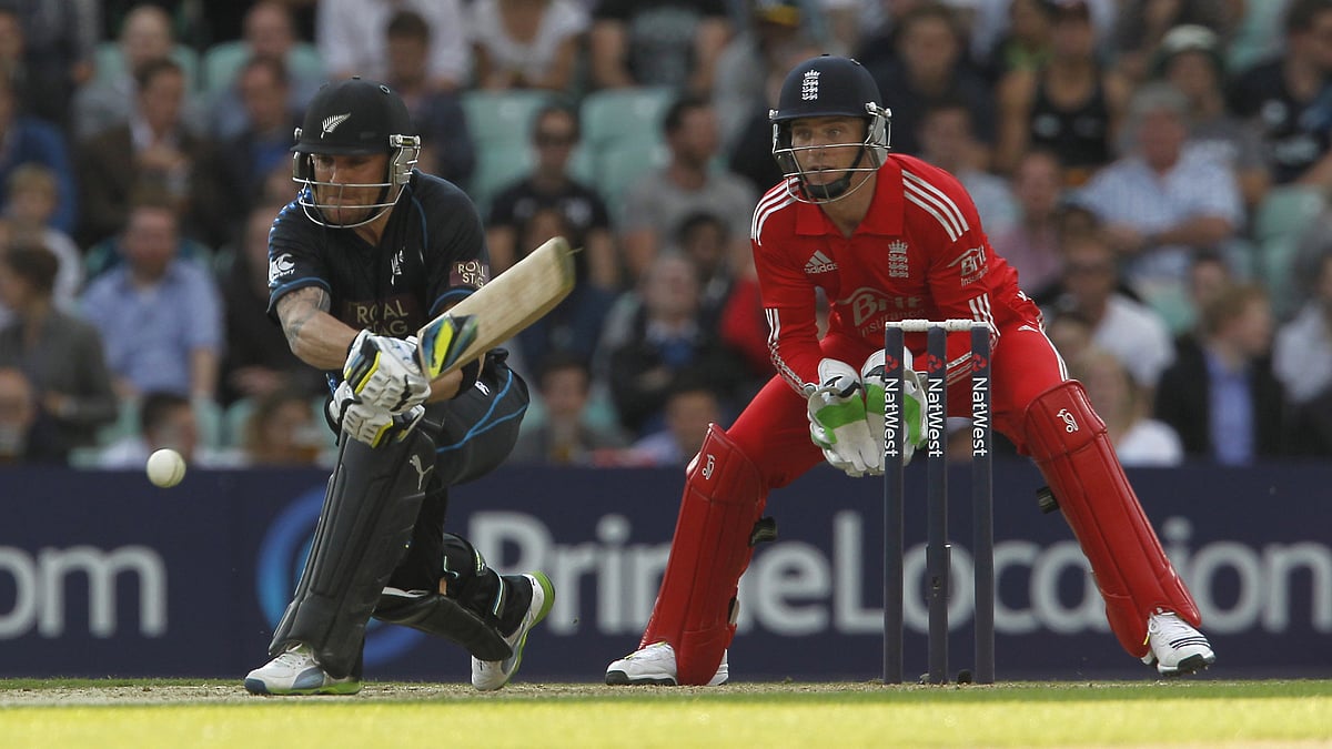 England coach Brendon McCullum and captain Jos Buttler as opposition players in 2013 - null