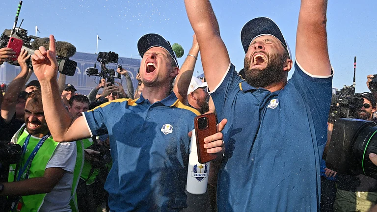 Europe's Justin Rose and Jon Rahm - null