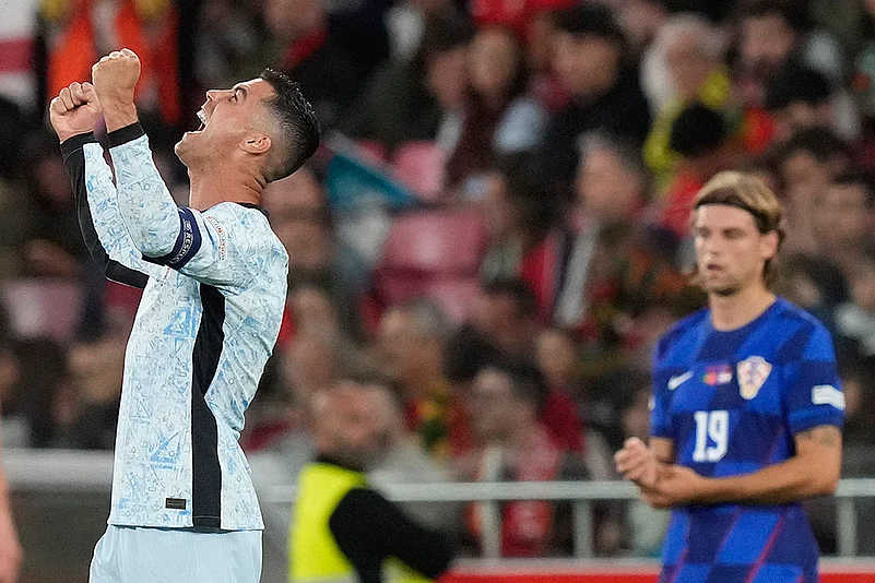 Portugals Cristiano Ronaldo celebrates after scoring his sides second goal
