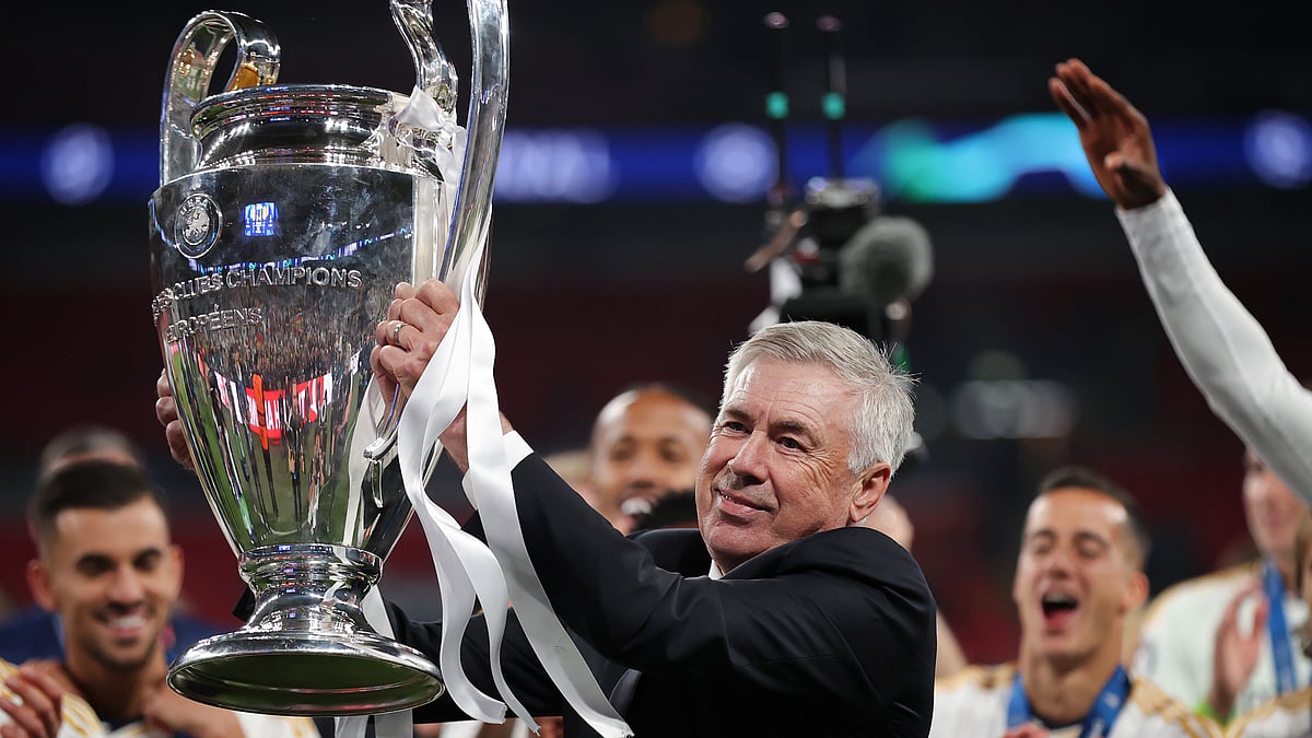 Carlo Ancelotti with the Champions League trophy. - null