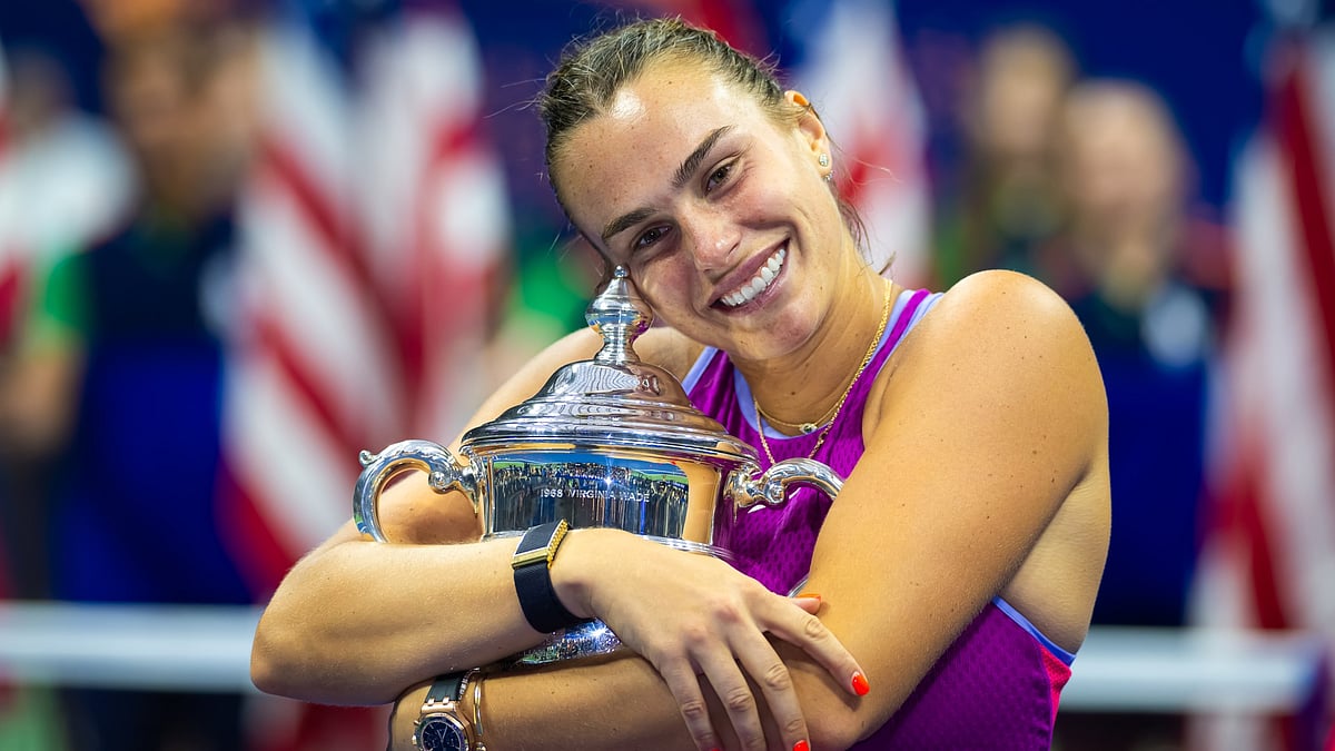 Aryna Sabalenka with the US Open trophy - null