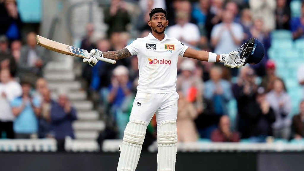 AP/John Walton : Sri Lanka's Pathum Nissanka celebrates his century on day four of the third Test against England at The Oval.