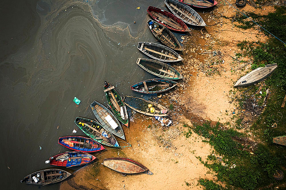 Paraguay Dry Weather: Fishing boats sit on the shore of the Paraguay River in Mariano Roque Alonso