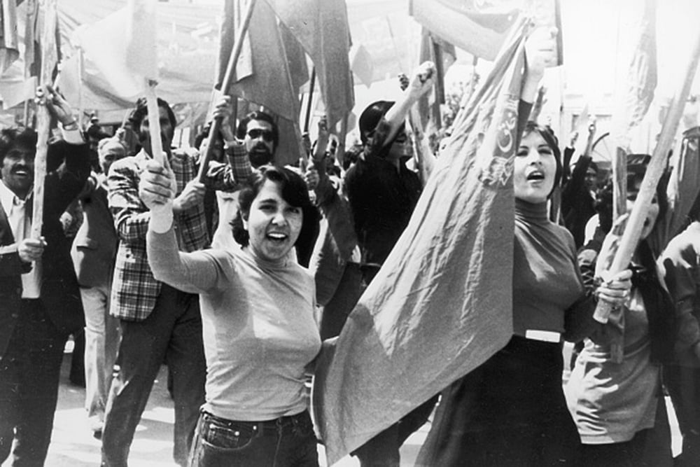 Afghan Female workers join the men on a march in Kabul