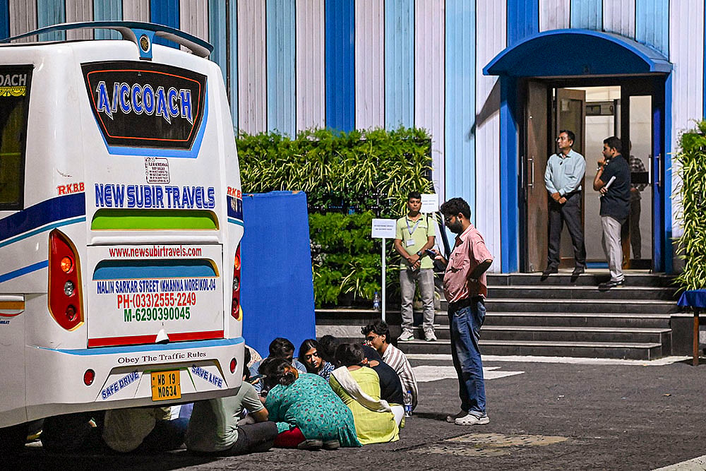 Junior doctors sit outside the West Bengal secretariat Nabanna