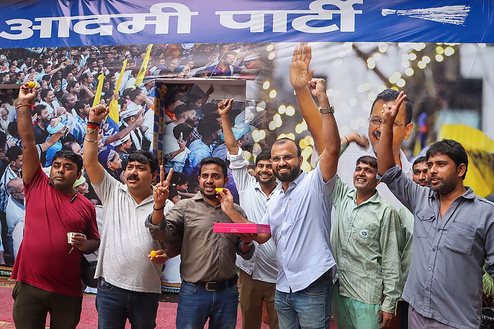 AAP workers celebrate after Kejriwal was granted bail