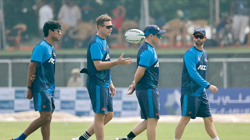 New Zealands captain, Tim Southee, second left, along with his teammates. AP Photo