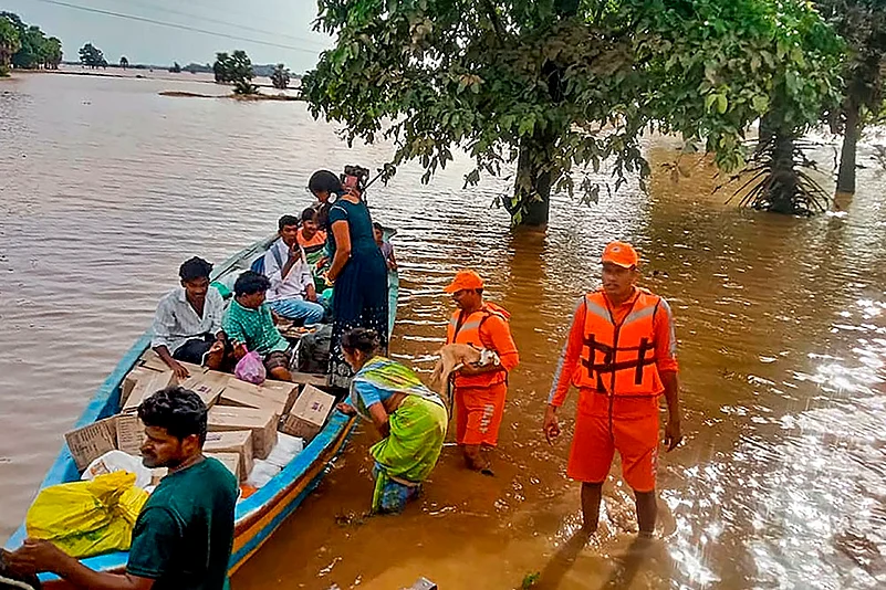 NDRF personnel evacuate people from Flood hit area in Andhra Pradesh