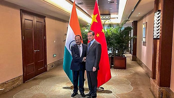 PTI : NSA Ajit Doval (L) with Chinese Foreign Minister Wang Yi 