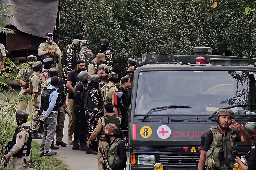 Security personnel during an encounter with militants in Baramulla