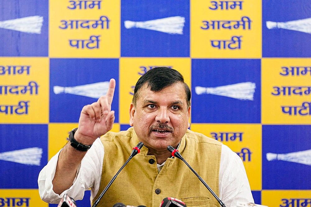 AAP leader Sanjay Singh addresses a press conference