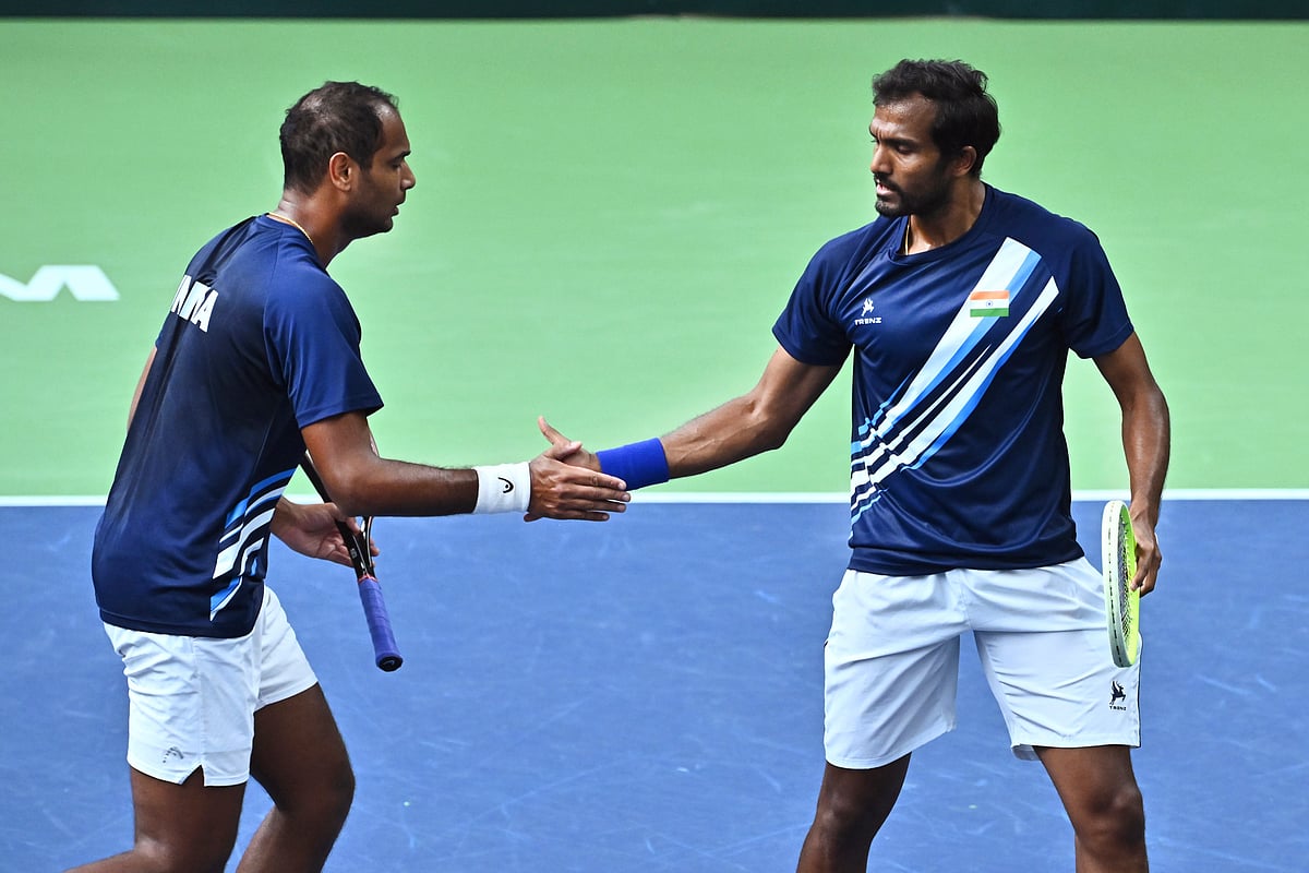 (Claudio Bresciani/TT via AP) : India's Sriram Balaji, right, and Ramkumar Ramanathan between points during the men's doubles match against Sweden's Filip Bergevi and Andre Goransson in the Davis Cup between Sweden and India in the Royal Tennis Hall, Stockholm, Sunday Sept. 15, 2024. 
