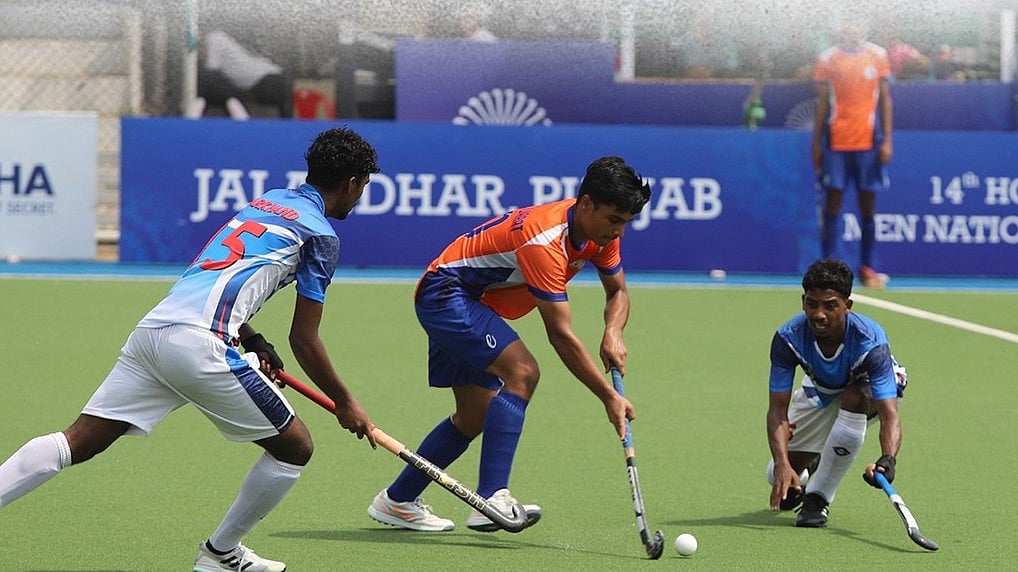 X | Hockey India : Jharkhand Hockey Team in action against Hockey Gujarat at the Hockey India Junior Men National Champ's 2024 in Jalandhar. 