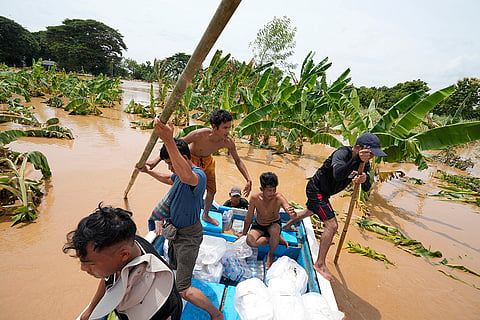 Myanmar floods: Local residents travel by boat in Naypyitaw
