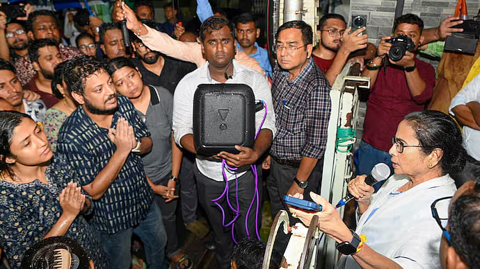 PTI : Junior doctors with West Bengal Chief Minister Mamata Banerjee in Kolkata