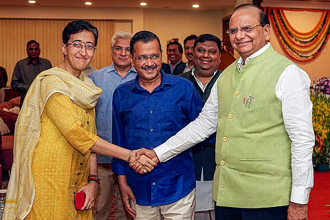 Delhi Lt Governor Vinai Kumar Saxena greets Atishi