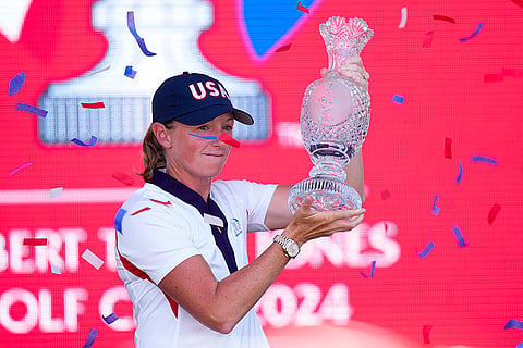 Solheim Cup Golf, United States vs Europe: United States Captain Stacy Lewis lifts the winner's trophy