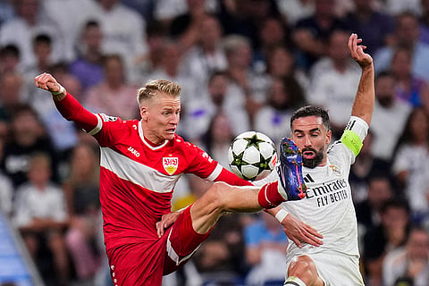 Champions League 2024-25, Real Madrid vs VfB Stuttgart: Stuttgart's Chris Fuehrich, left, vies for the ball with Real Madrid's Dani Carvajal