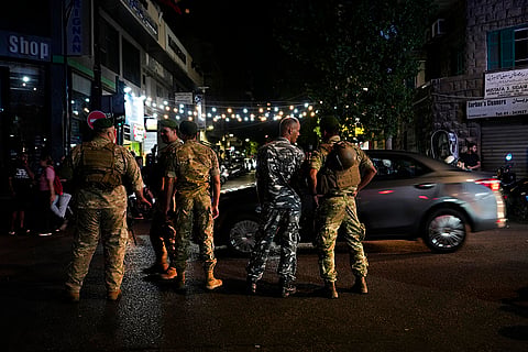 Lebanon Pager Explosions: Lebanese soldiers stand guard at a street