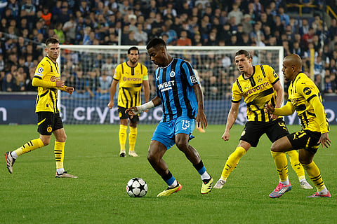 UEFA Champions League, Club Brugge vs Borussia Dortmund: Brugge's Raphael Onyedika controls the ball 