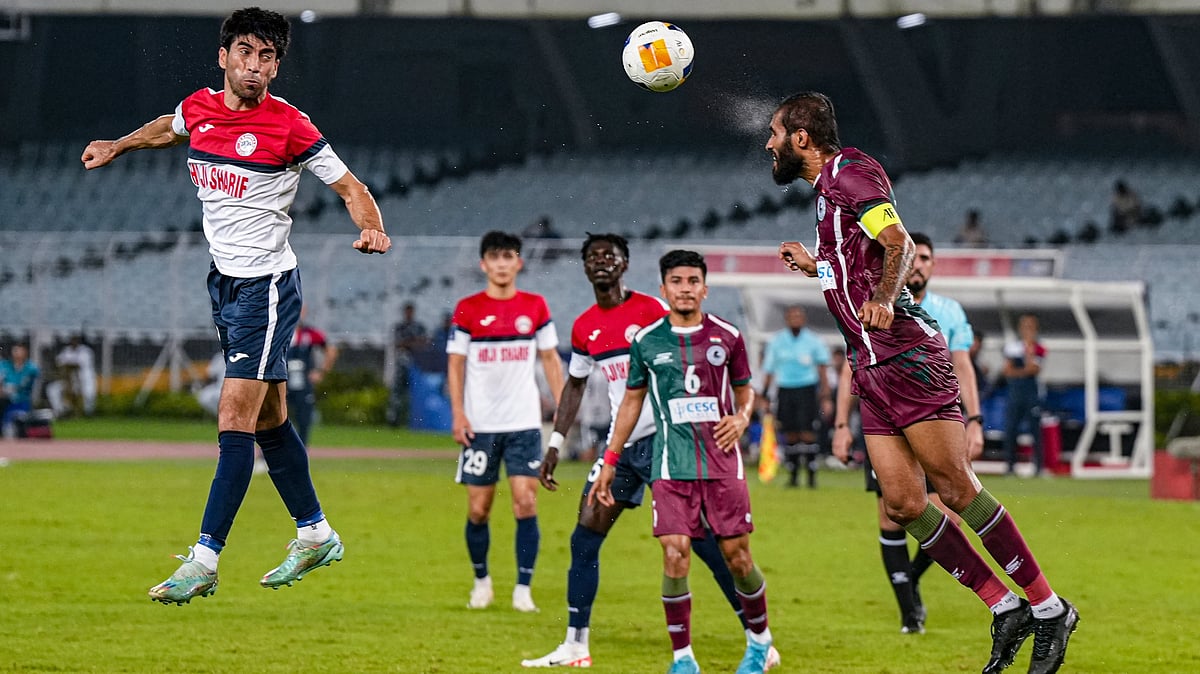 AP/Swapan Mahapatra : Mohun Bagan Super Giants (India) and FC Ravshan (Tajikistan) players vie for the ball during AFC Champions League Two Group A match, at VYBK stadium in Kolkata, Wednesday, Sept 18, 2024.