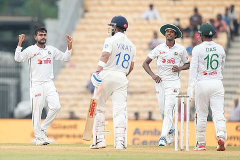 IND Vs BAN, 1st Test Day 2: Bangladesh's Mehidy Hasan Miraz, left, celebrates the wicket of India's Virat Kohli