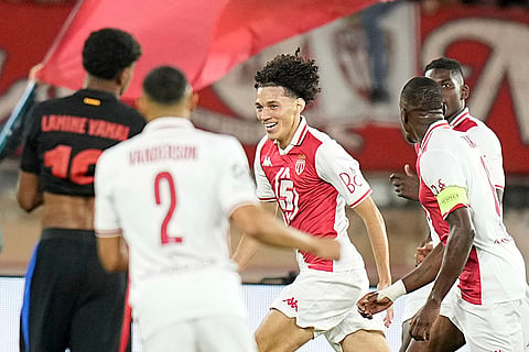UEFA Champions League, Monaco and Barcelona: Monaco's Maghnes Akliouche, center, celebrates after scoring his side's opening goal