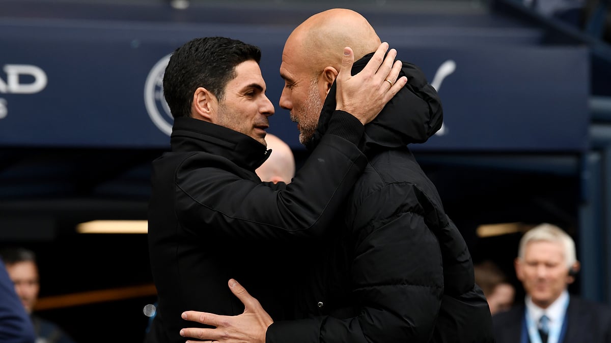 Mikel Arteta and Pep Guardiola.  - null