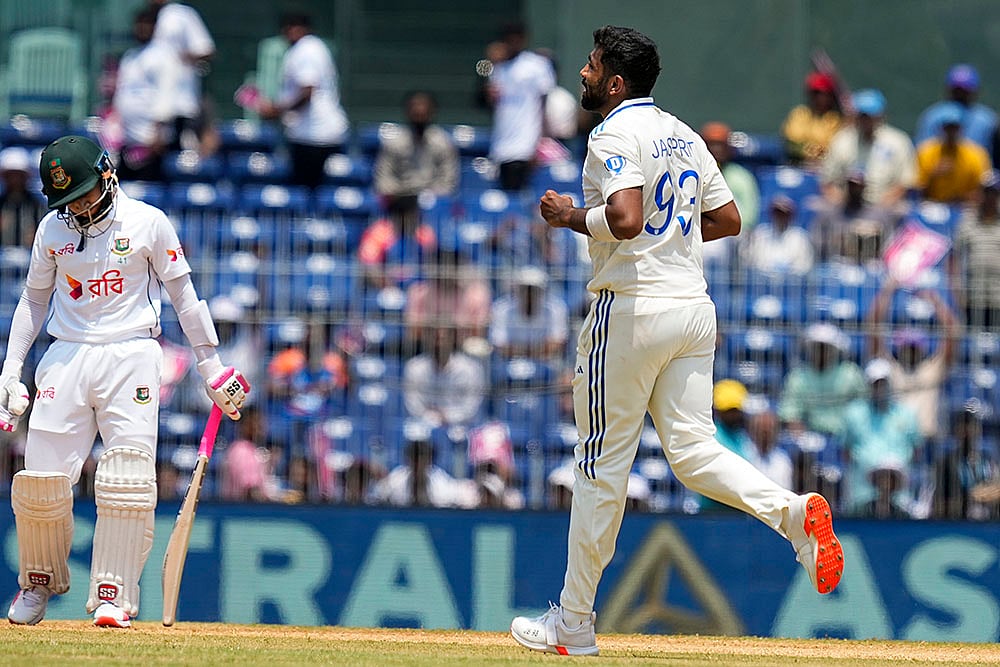 IND vs BAN, 1st Test Match-Day 2: Jasprit Bumrah celebrates the wicket of Mushfiqur Rahim 