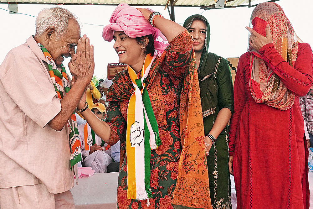 Now, Fighting for Support: Congress Candidate Vinesh Phogat campaigning in Julana, Haryana - Photo: Tribhuvan Tiwari