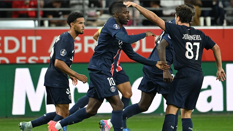 Ousmane Dembele celebrates his equaliser - null