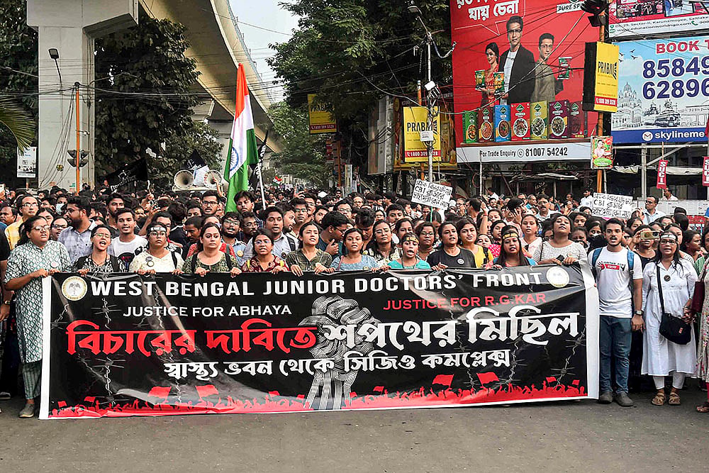 | Photo: PTI : Kolkata Rape Case: Junior doctors during a rally to CBI office