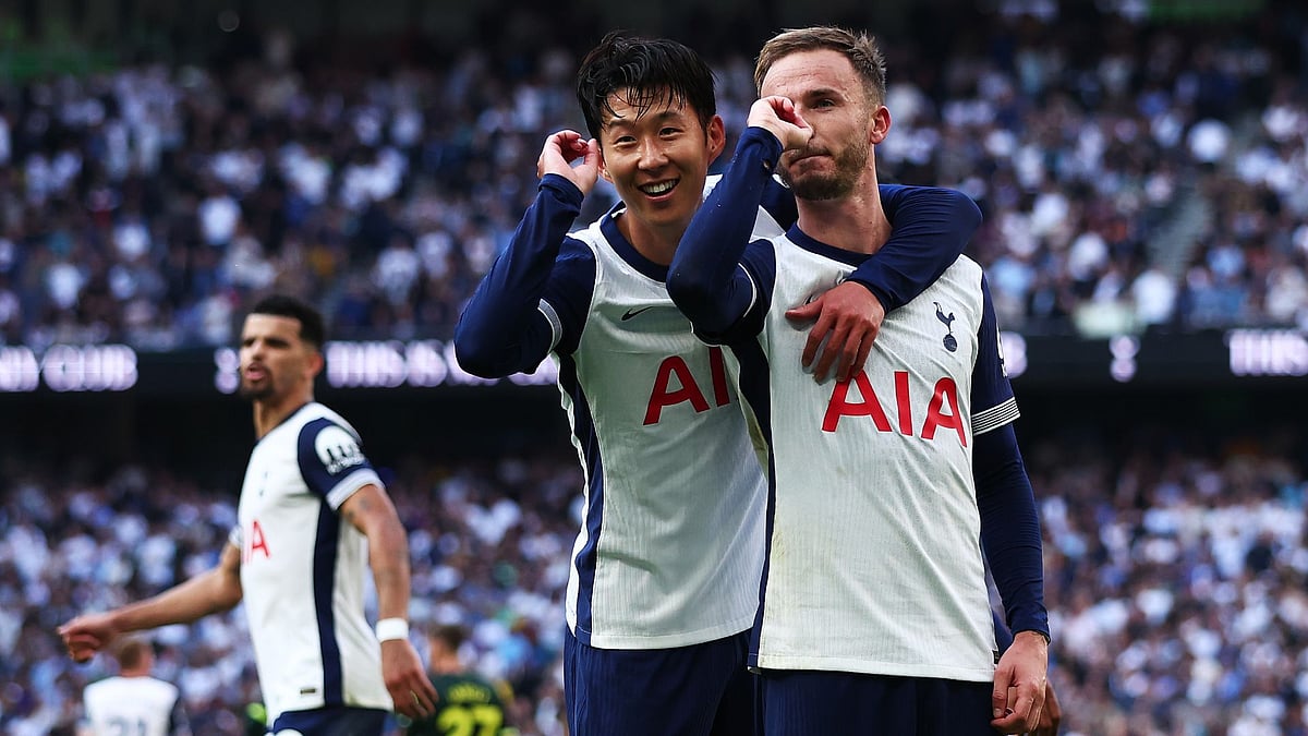 Son Heung-min and James Maddison celebrate Tottenham's third goal