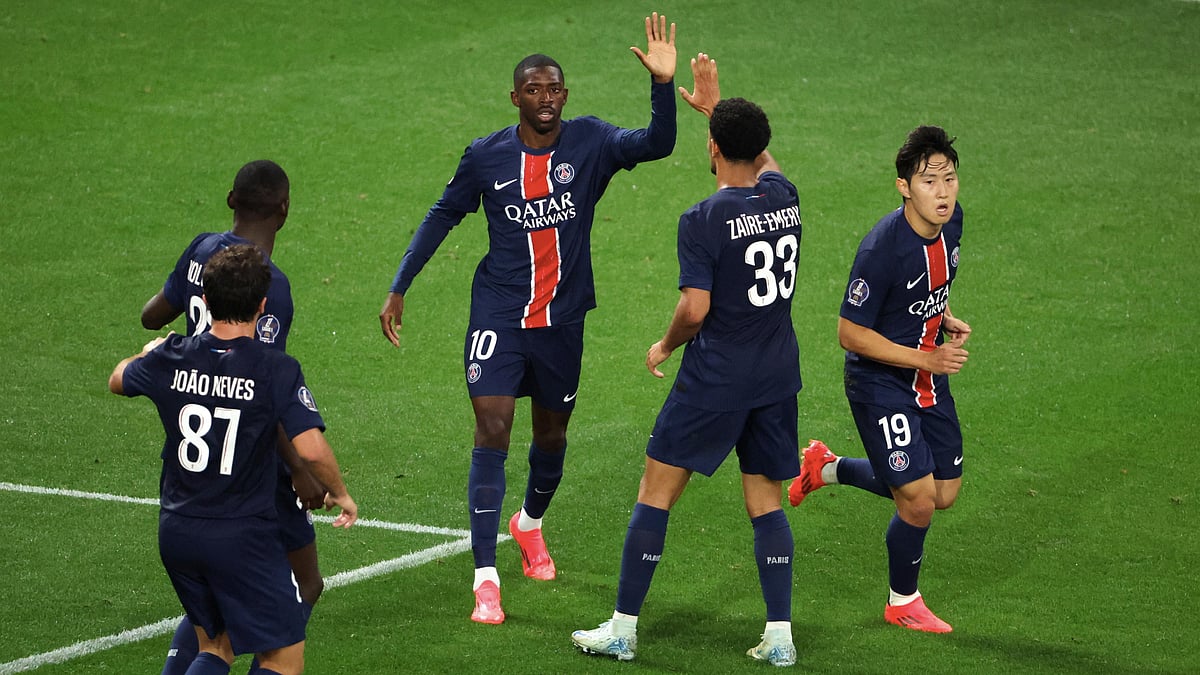 Ousmane Dembele celebrates after scoring versus Reims. - null