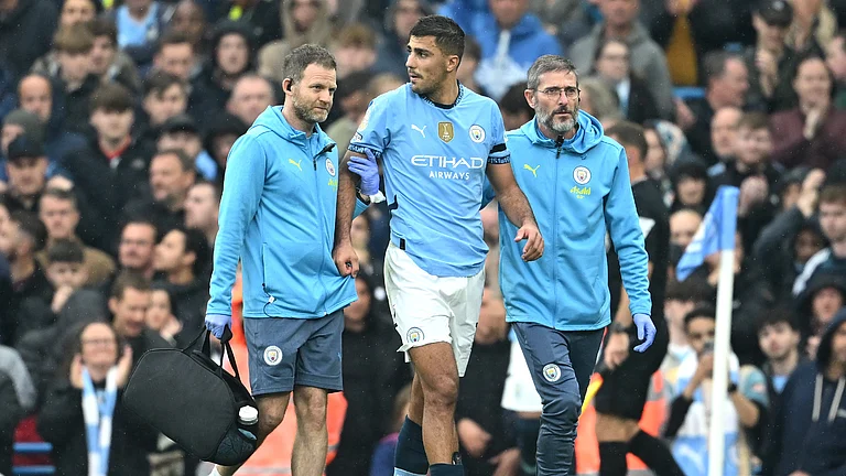 Rodri is helped from the field - null