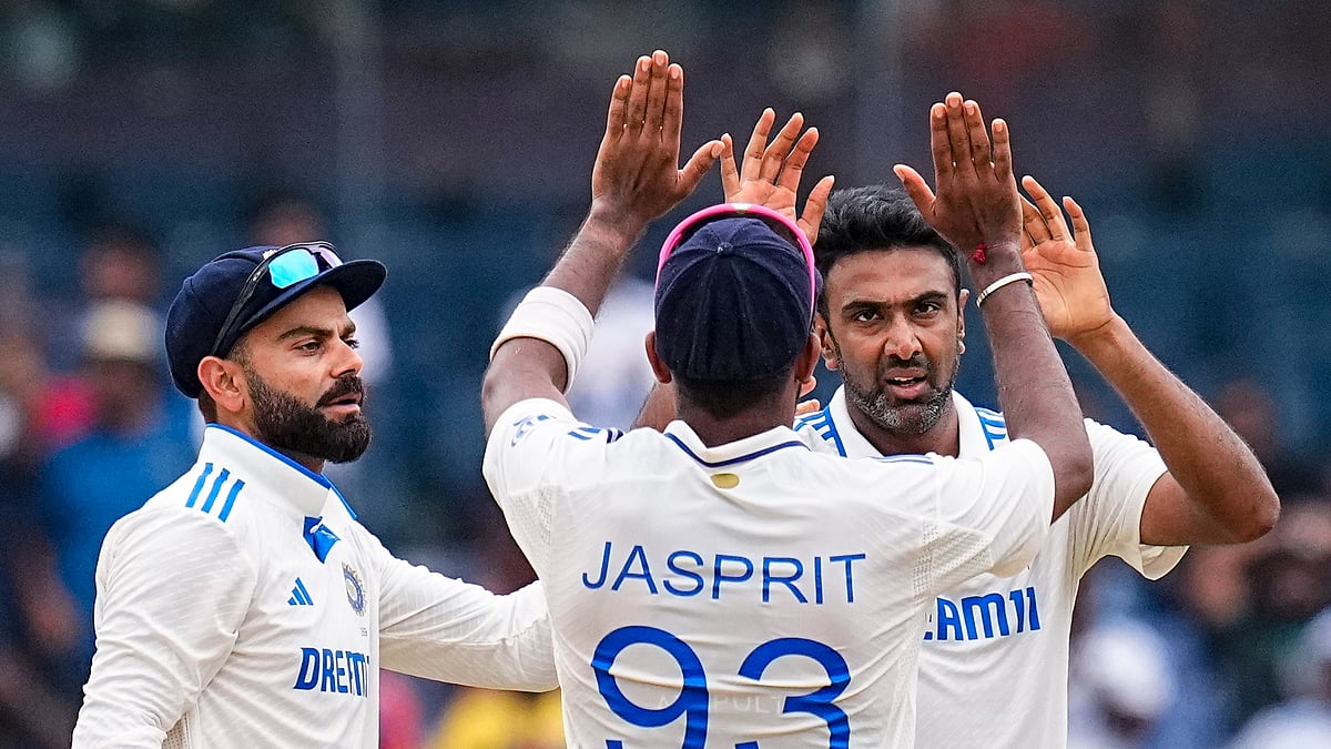 India's Ravichandran Ashwin with teammates celebrates the dismissal of Bangladesh's Mominul Haque on the third day of the first test cricket match between India and Bangladesh in Chennai. - PTI Photo/R Senthilkumar