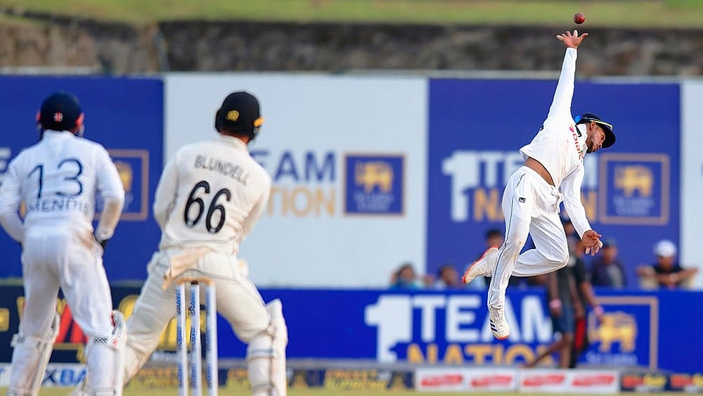| Photo: AP/Viraj Kothalawala : SL Vs NZ, 1st Test: Sri Lanka's Pathum Nissanka, right, tries unsuccessfully to catch New Zealand's Tom Blundell