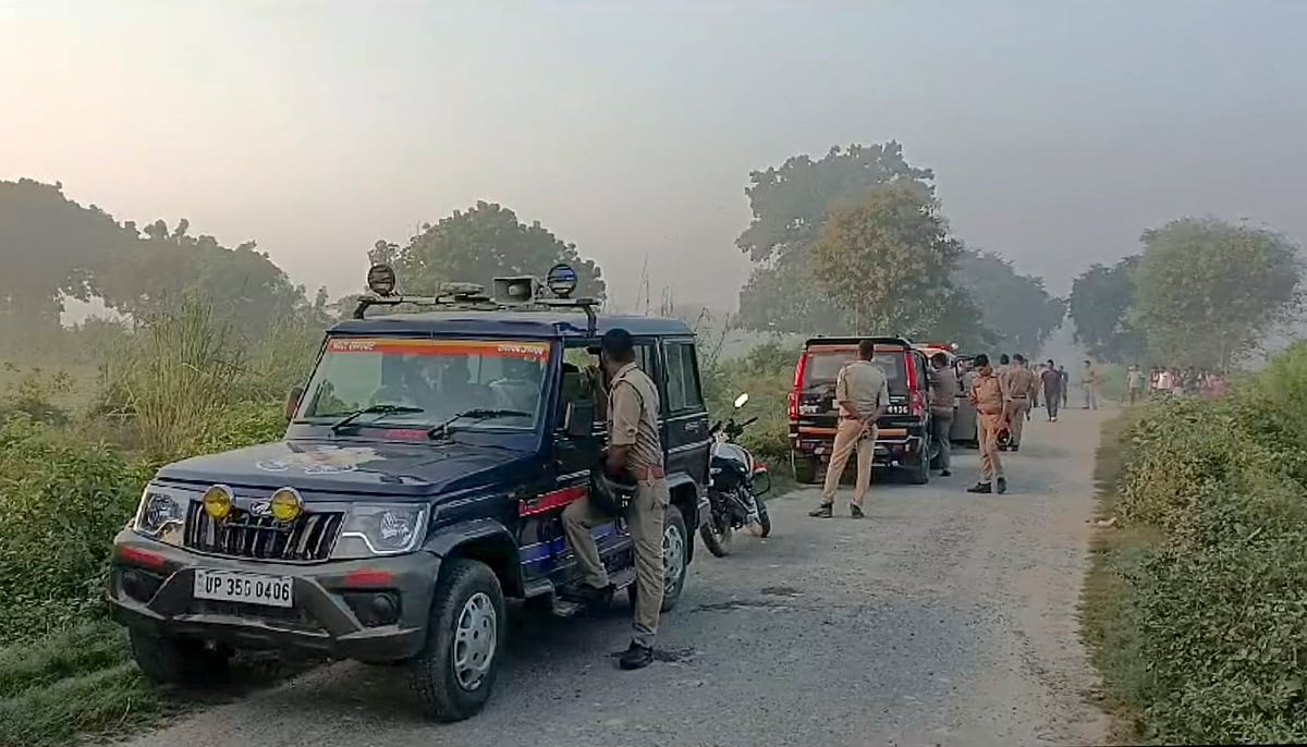 PTI : Police at the site of encounter after killing of Anuj Pratap Singh, who robbed Sultanpur's Bharti Jewelers, at Achalganj, Unnao, Monday