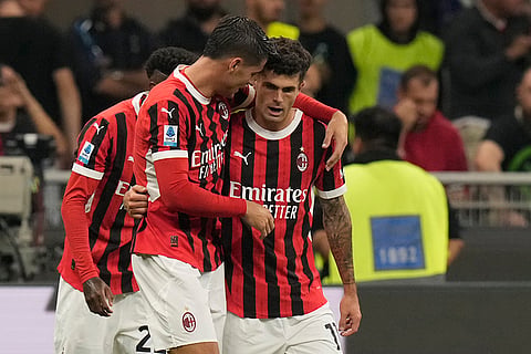 Serie A Soccer, Inter Milan Vs AC Milan: AC Milan's Christian Pulisic, right, celebrates with Alvaro Morata after scoring the opening goal