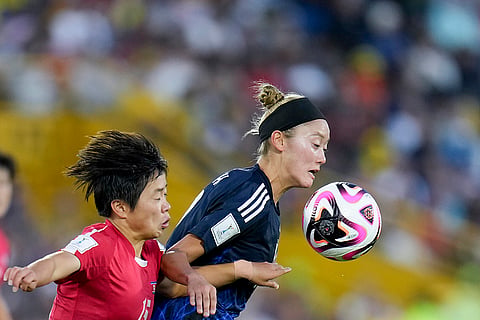U-20 Women's World Cup, North Korean vs Japan: Japan's Chinari Sasai, right, and North Korea's Choe Il Son battle for the ball