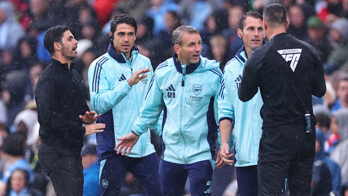Mikel Arteta reacts to Leandro Trossard's red card at the Etihad Stadium - null