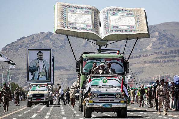 via Getty Images : An installation depicting an open copy of the Quran