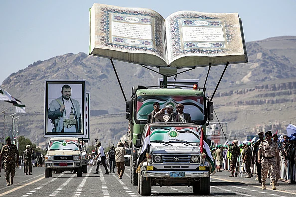 An installation depicting an open copy of the Quran