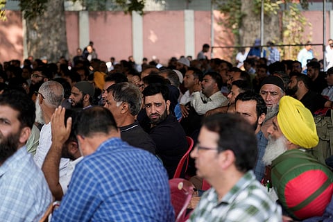 J&K Polls 2024: Polling officials assemble to receive electronic voting machines and other election material