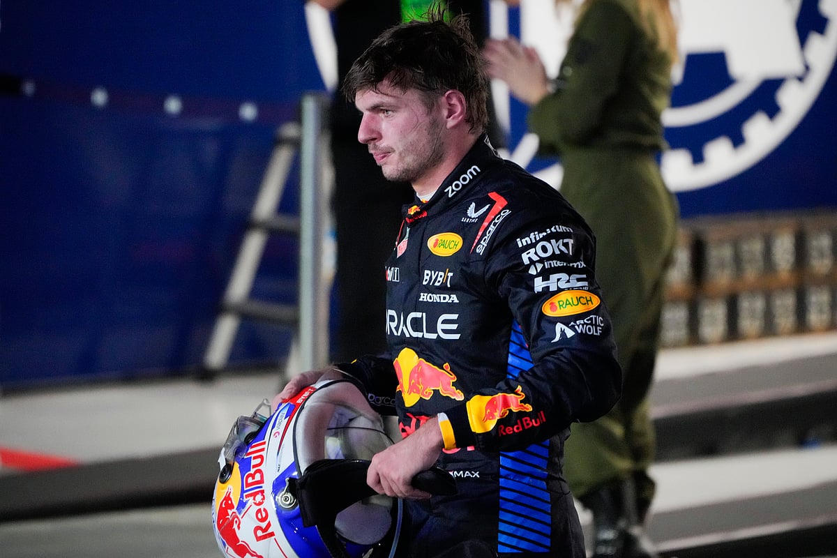 Red Bull driver Max Verstappen of the Netherlands reacts after his second place finish in the Singapore Formula One Grand Prix at the Marina Bay Street Circuit, in Singapore, Sunday, Sept. 22, 2024. -  (AP Photo/Vincent Thian)
