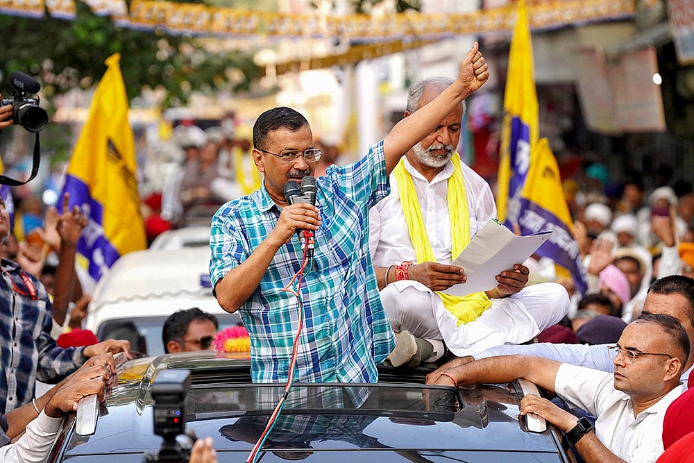 | Photo: PTI : 2024 Haryana Assembly polls: Aam Aadmi Party National Convenor Arvind Kejriwal during a roadshow in Sirsa
